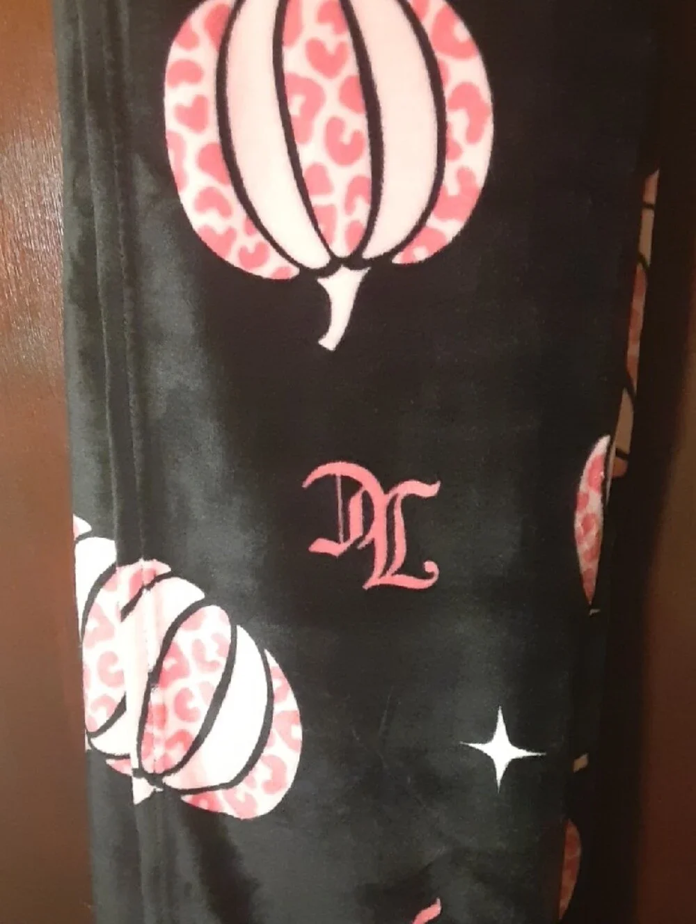 Twin Juicy Couture Black Plush Throw with Pink Pumpkin Motif